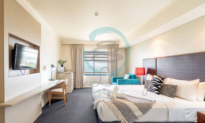 Darwin City Centre Apartment | Hotel Suite: Sunset View ~ Pool ~ Balcony ~ Office