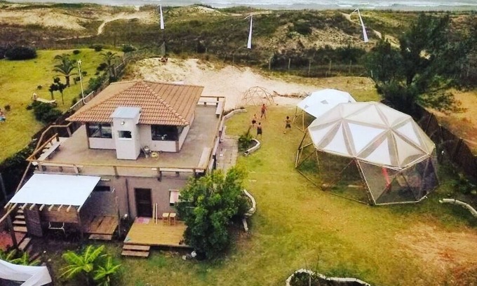 Barra de Ibiraquera House | House foot in the sand in Barra da Ibiraquera.