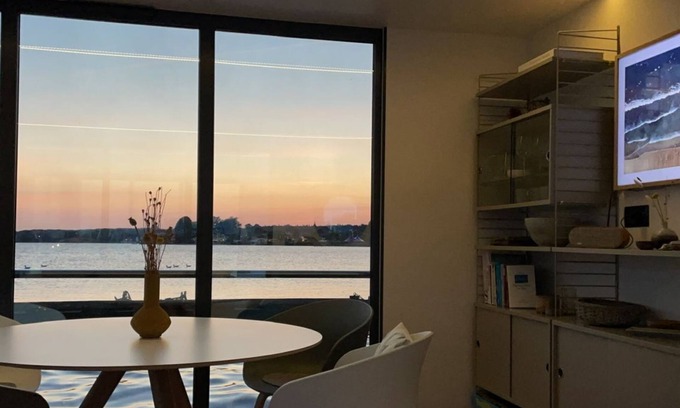 Schleswig Boat Rental | Houseboat Fjord anchorage with bio-sauna and roof terrace in Schleswig