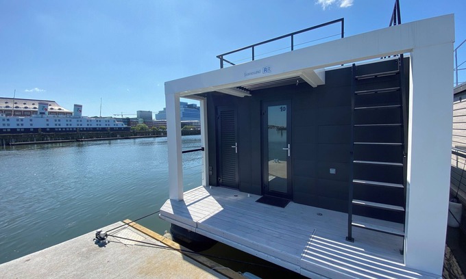 Lundby Boat Rental | Houseboat SVANESUND with roof terrace in the heart of Gothenburg