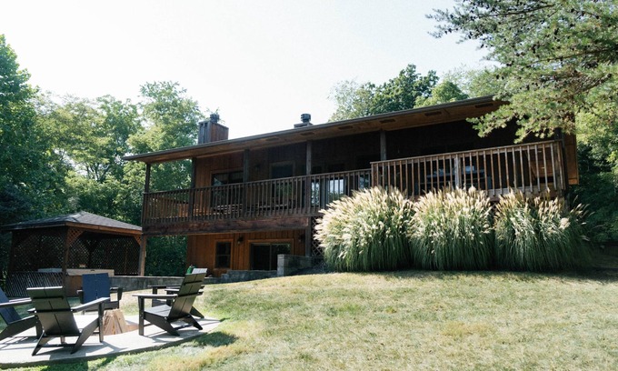 Logan Ski Chalet | Houston Lodge, 5BR Lodge with a large covered porch and a great view