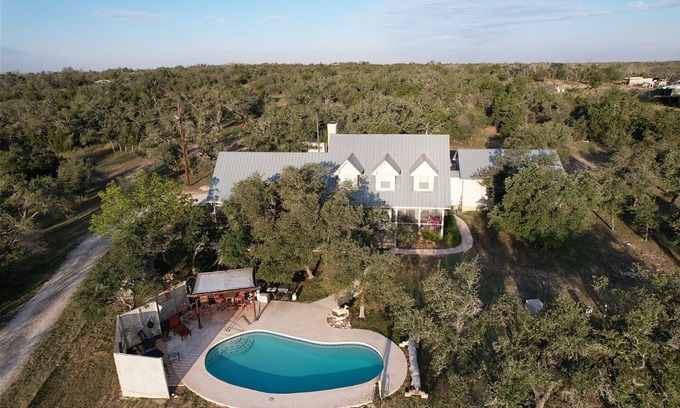 Harper House | Howl Haus Hideaway, with relaxing pool.