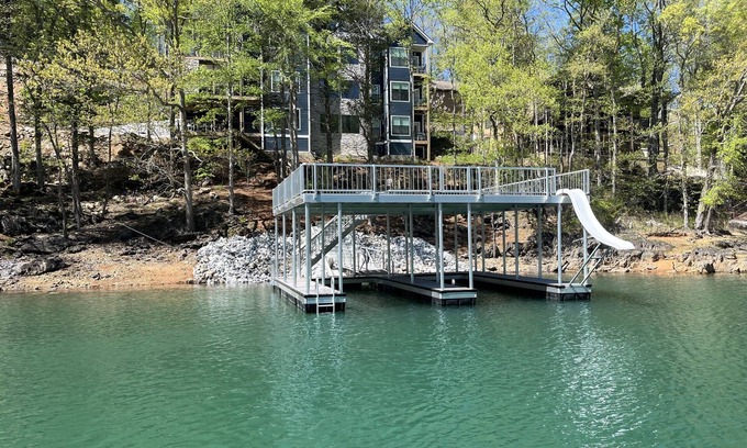 Jacksboro House | HUGE 10BR lakefront w/double deck dock, movie theatre, 2 hot tubs, dual kitchen