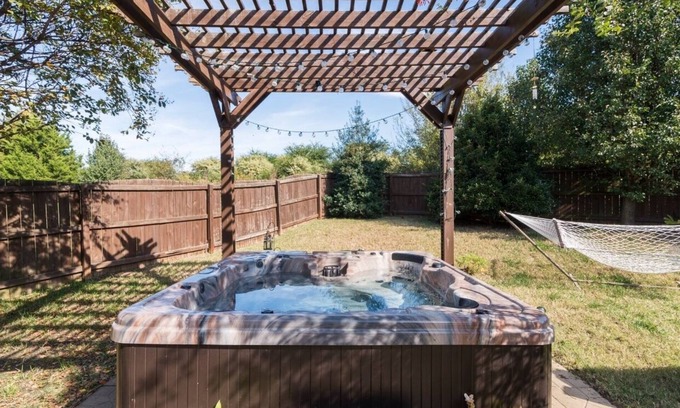 Mount Mourne House | Hummingbird Manor - Relax in Hot Tub in Private Backyard with fire pit area
