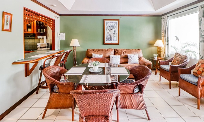 Damas Condo | Ideally Located Tropical Escape W/ Lush Gardens, & Shared Pool!