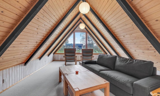 Østerskov House | In Bukkemose you will find this beautiful vacation home made of stone and wood.