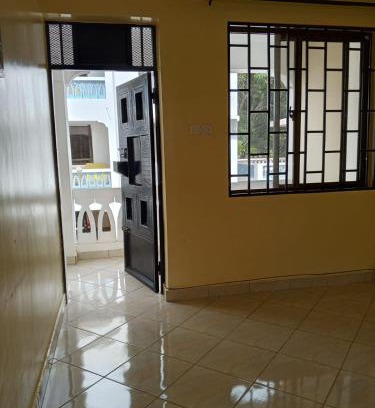 Manyimbo House | Indian ocean apartments you get the master bedroom with the private bathroom and the host sleeps in the other bedroom you share kitchen anc living room
