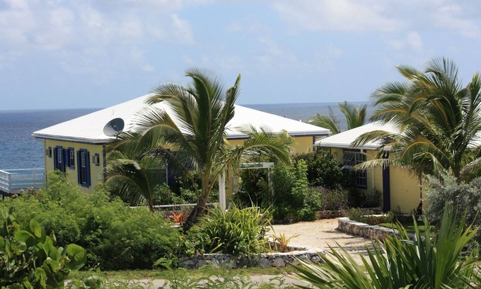 Rainbow Bay Cottage | Indigo Seas- Panoramic Ocean View, Secluded Cottage