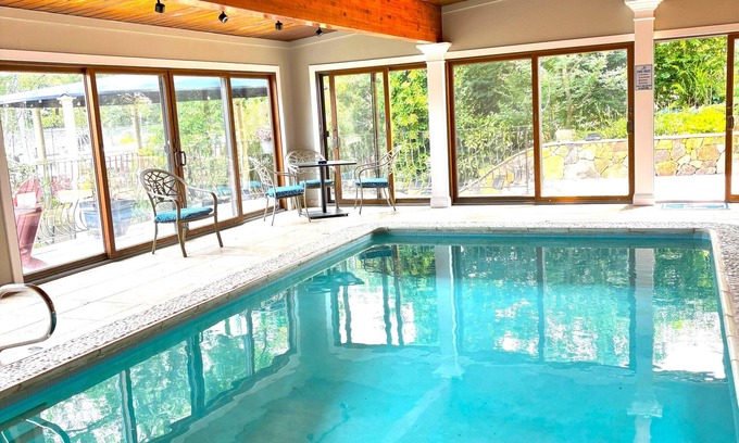 Eastport House | Indoor/Outdoor waterfront oasis with indoor heated pool awaits you in Eastport!