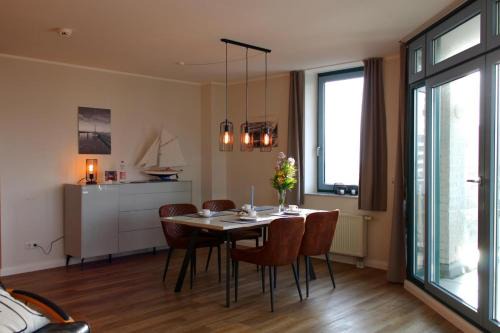 Fehmarn House | Inselblume 55 - Ferienwohnung in der Strandburg mit Hund
