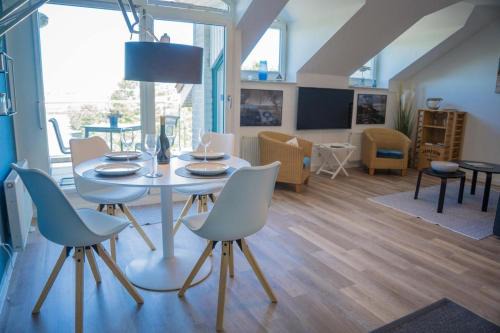Fehmarn House | Inselblume 78 - Ferienwohnung mit Strandkorb in Burgtiefe