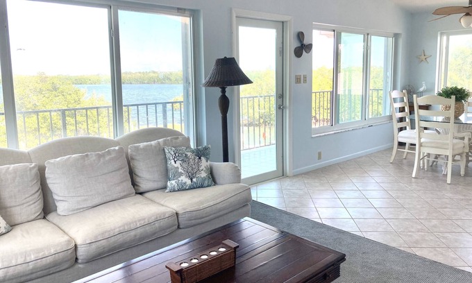 Marathon Cottage | Instant open water access! Private beach, dock. Rates start at 1995 inquire