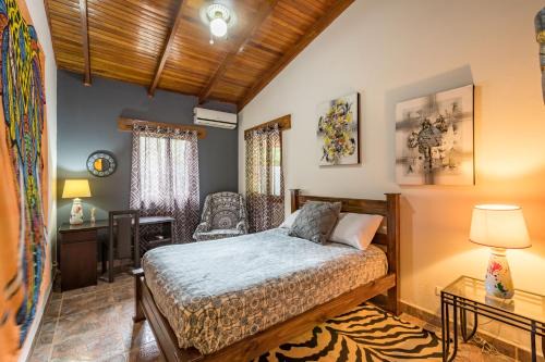 Barrio Las Parcelas House | Intimate Earthy Vibe - Bedroom in a Tropical Paradise