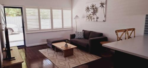 Rockingham Apartment | Inviting Stay Close to Rockingham and Palm Beach - Hosted by Canstay