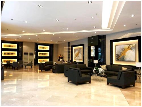 Highway Hills Apartment | Iona Reign's Vacation Unit at FAME Residences