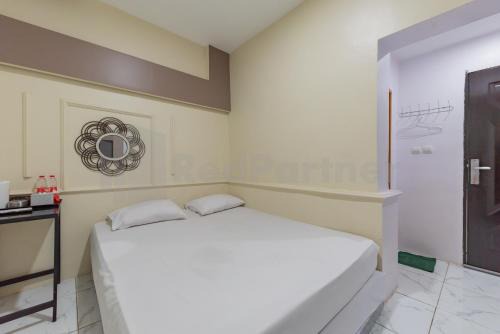 Karawang Timur Hotel | JM Guest House Lamaran RedPartner