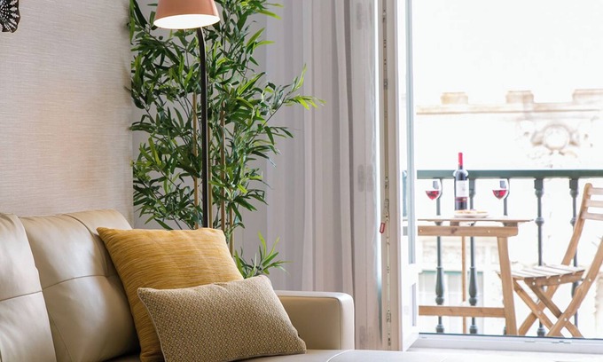 Chiado Apartment | JOIVY Sunny 1-bed flat w/terrace&sea view in Baixa, 3mins to Arco da Rua Augusta
