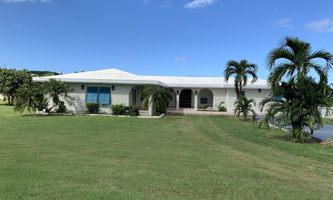 Judith's Fancy House | Judith's Fancy Aqua Blue in a secure neighborhood & walking distance to beach.
