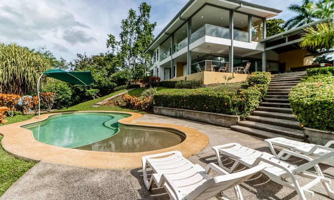 Tarcoles House | Jungle dog-friendly home with ocean views from the pool, gas grill & pool table