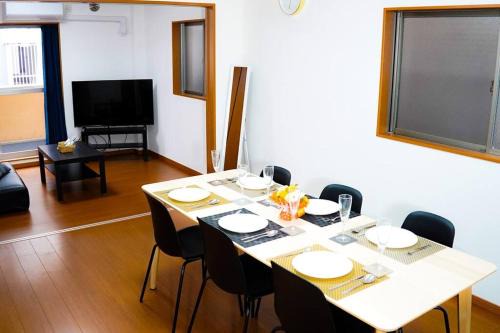 Minato Apartment | kanau 駅から2分 USJ空庭難波梅田まで10分!まるごと一軒家貸し切り!大人数宿泊可能!駐車場有