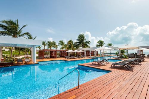 Playa Mujeres Apartment | La Amada, Private Terrace Penthouse in Beachfront Complex