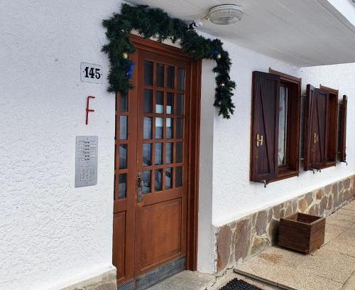 Folgarida Apartment | La casa nel verde, un nido accogliente con vista