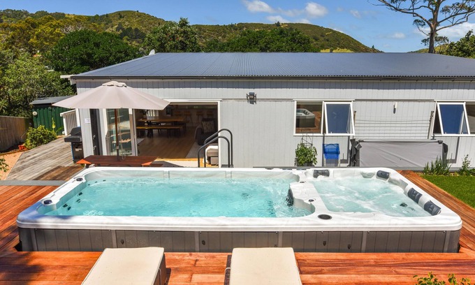 Ostend Villa | La Maison Soleil - Modern, sun-filled home with 4 bedrooms (2 kings including a stand-alone sleepout in the pool area, 2 queens) and 3 tiled bathrooms. Features a full kitchen, aircon, and open living flowing to a large garden with BBQ, heated swim s
