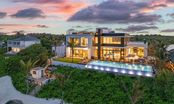 Dunmore Town House | La Palmeraie Modern House, Oceanfront, private beach, rooftop deck, maid & more!