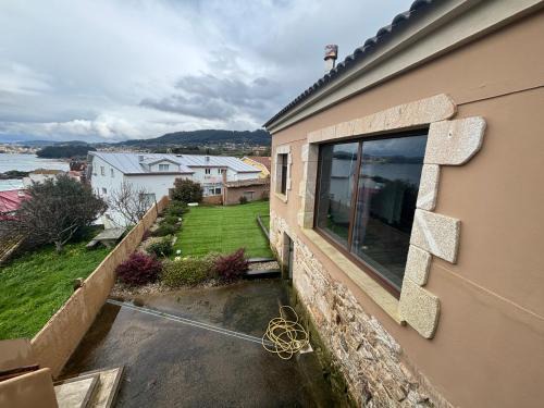 Bueu House | La pradera