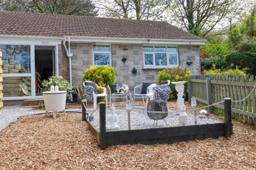 Tintagel House | Laburnham Bungalow