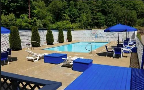Gilford Apartment | Laconia Vacation Spot, Pool ,Free WiFi & Parking at 131 Lake Street