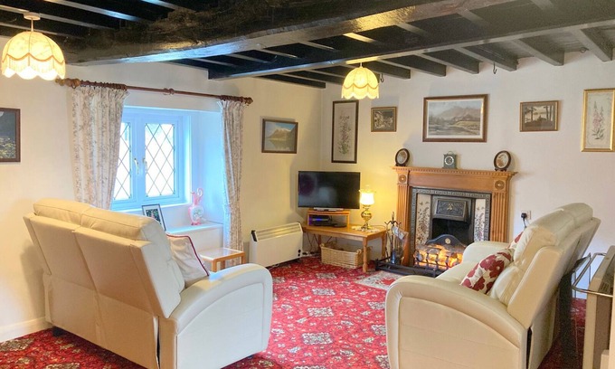 Greystoke Cottage | Lake District oak-beamed cottage.Pet welcome. Summer heated outdoor pool.
