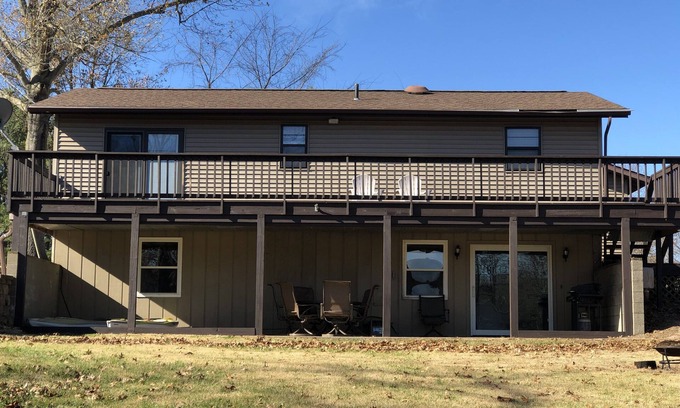 Marion House | Lake of Egypt 4 bedroom home sleeps 8 with dock and flat yard and lakefront!