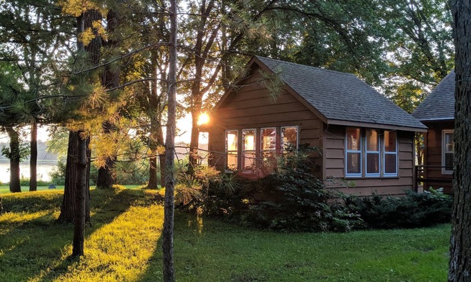 Darwin Cabin | Lake Stella beautiful beach and spacious deck on quiet private drive.