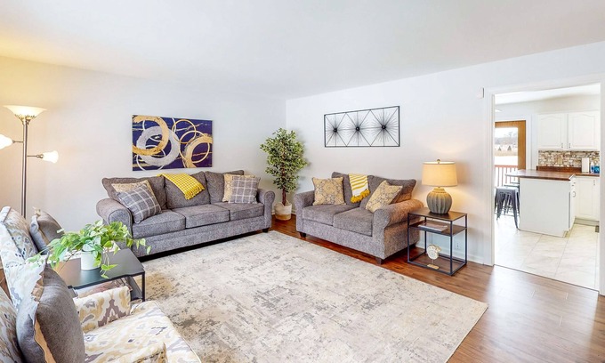 Portage House | Lake-view home with private hot tub, deck
