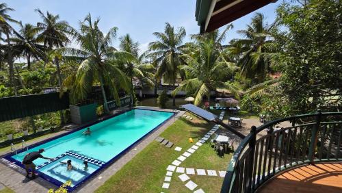 Uswetakeiyawa House | Lake View Resort by TropiCube