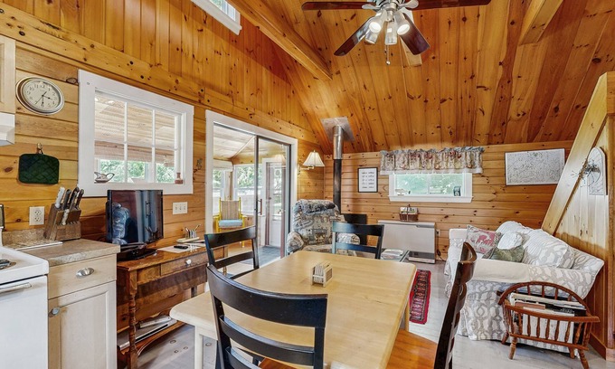 Greenville Cottage | Lakefront, cabin-inspired home with firepit, grill, & screened porch, Wifi
