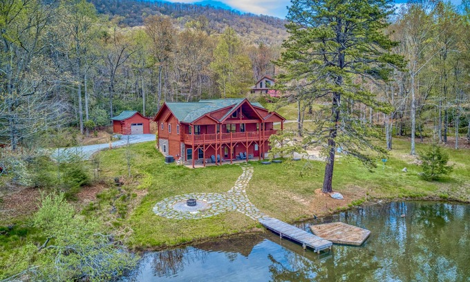 Mills River Cabin | Lakefront cabin & tiny home with a firepit, wet bar, washer/dryer, dock