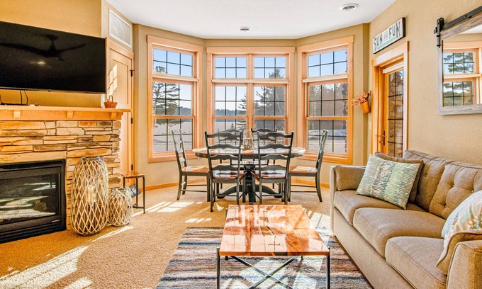 Three Lakes Condo | Lakefront condo with fireplace, hot tubs, heated pool, tennis, gym, firepit, AC