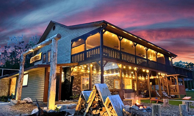La Follette Cabin | Lakefront, covered dock, hot tub, game/pool rm, 4wd trails, firepits, 22 people