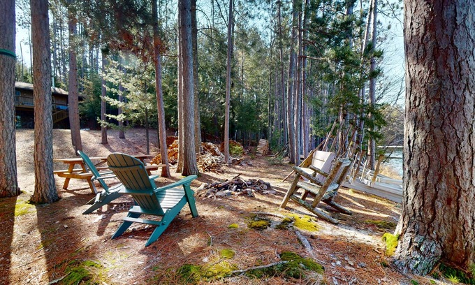 Three Lakes House | Lakefront, dog-friendly home w/private dock ,fire pit & a beautiful lakeview!