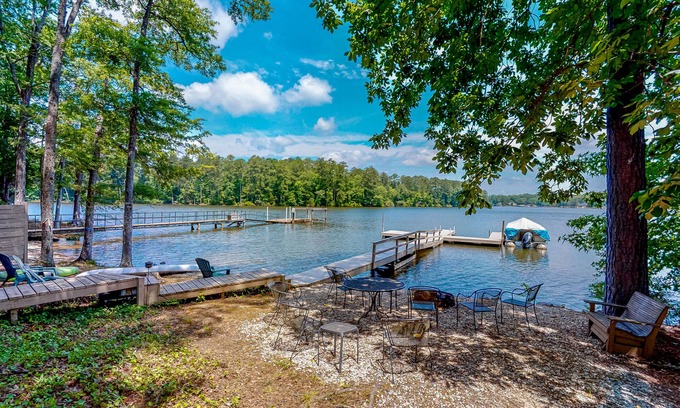 Leesville House | Lakefront dream with serene view, private dock, foosball, firepit - dog-friendly