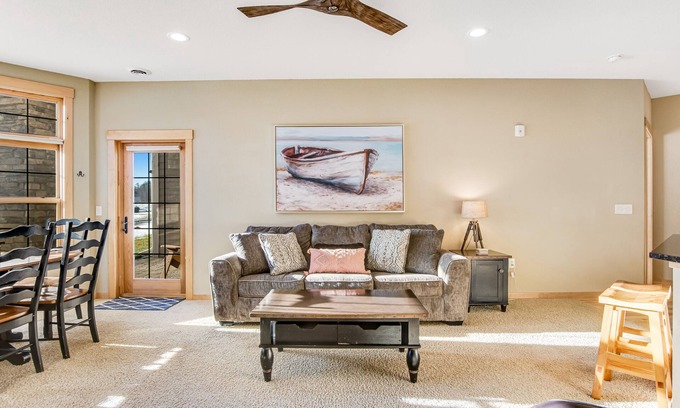 Three Lakes Condo | Lakefront, ground floor condo with indoor pool - fireplace, patio & washer/dryer