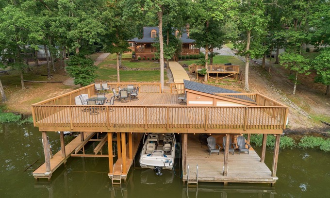 Wise Cabin | Lakefront Home w/Guest House, Tiki bar, Dock, Pet friendly, Kayaks,Peddle boats