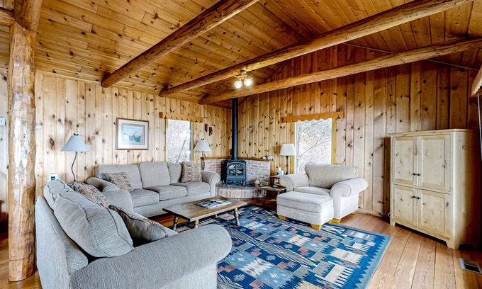 Lakeside Cabin | Lakefront home with amazing mountain views, wraparound deck, fireplace, & grill