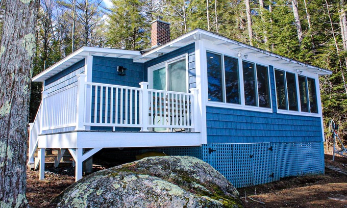 Laconia Cottage | Lakefront home with a deck, gas grill, WiFi, dock & golf nearby