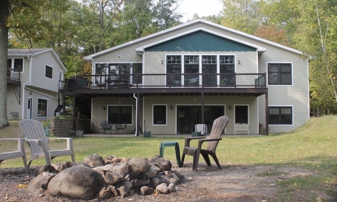 Sarona House | Lakefront House on Long Lake, Beautiful View with Private Docks on Flat Lot.