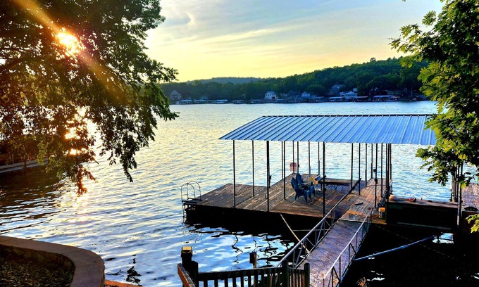 Cartwright Cove House | Lakefront pet-friendly home/private dock with boat slip and two place PWC lift.