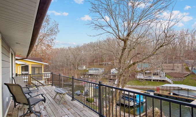 Barnett House | Lakefront retreat with a private dock, furnished patio & washer/dryer