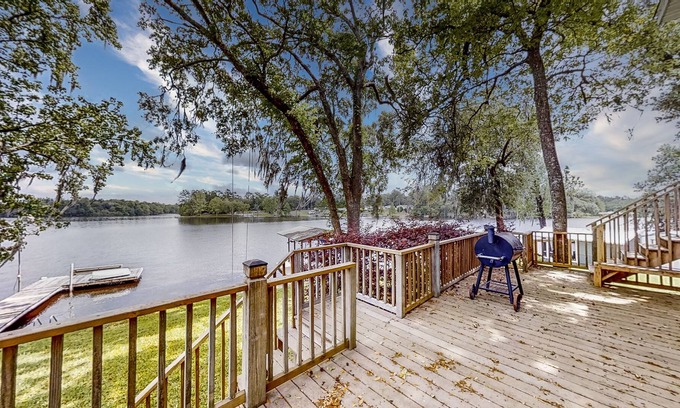 Telogia House | Lakefront stunner with large screened-in porch